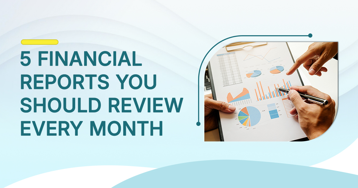 Business professionals reviewing monthly financial reports with charts and graphs for better financial planning